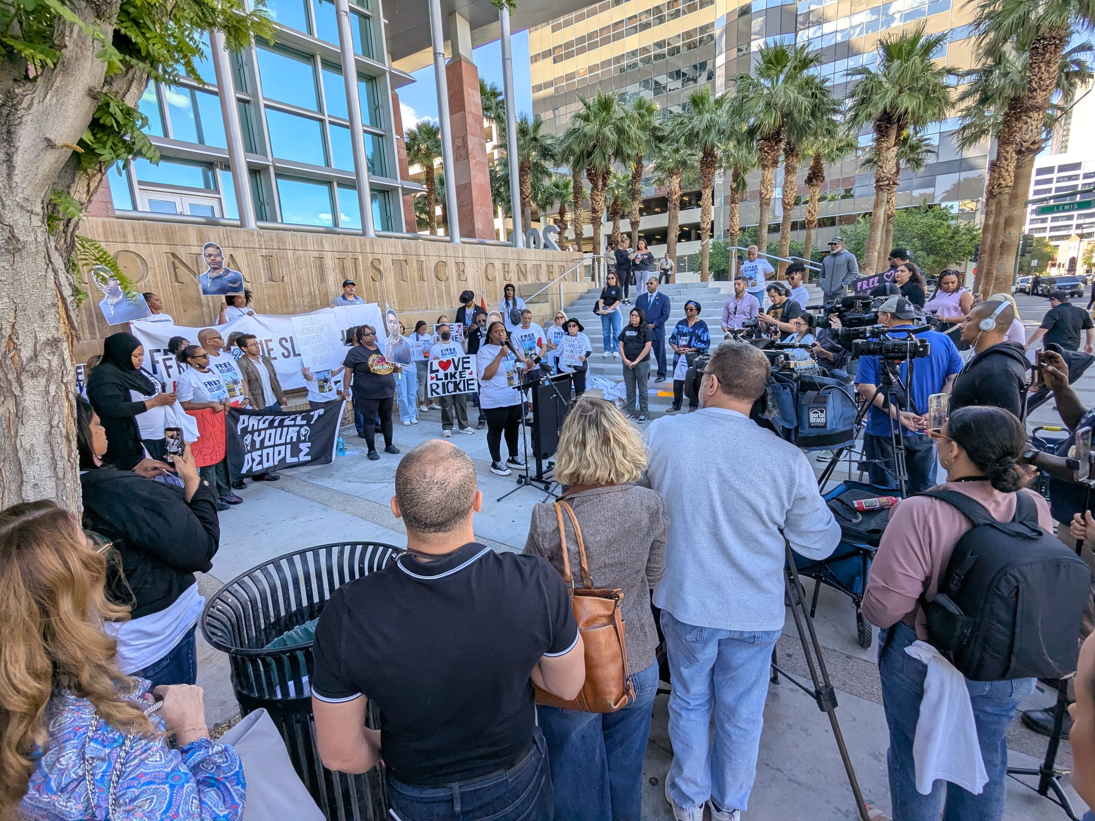 Community members and press gathered in support of Rickie Slaughter